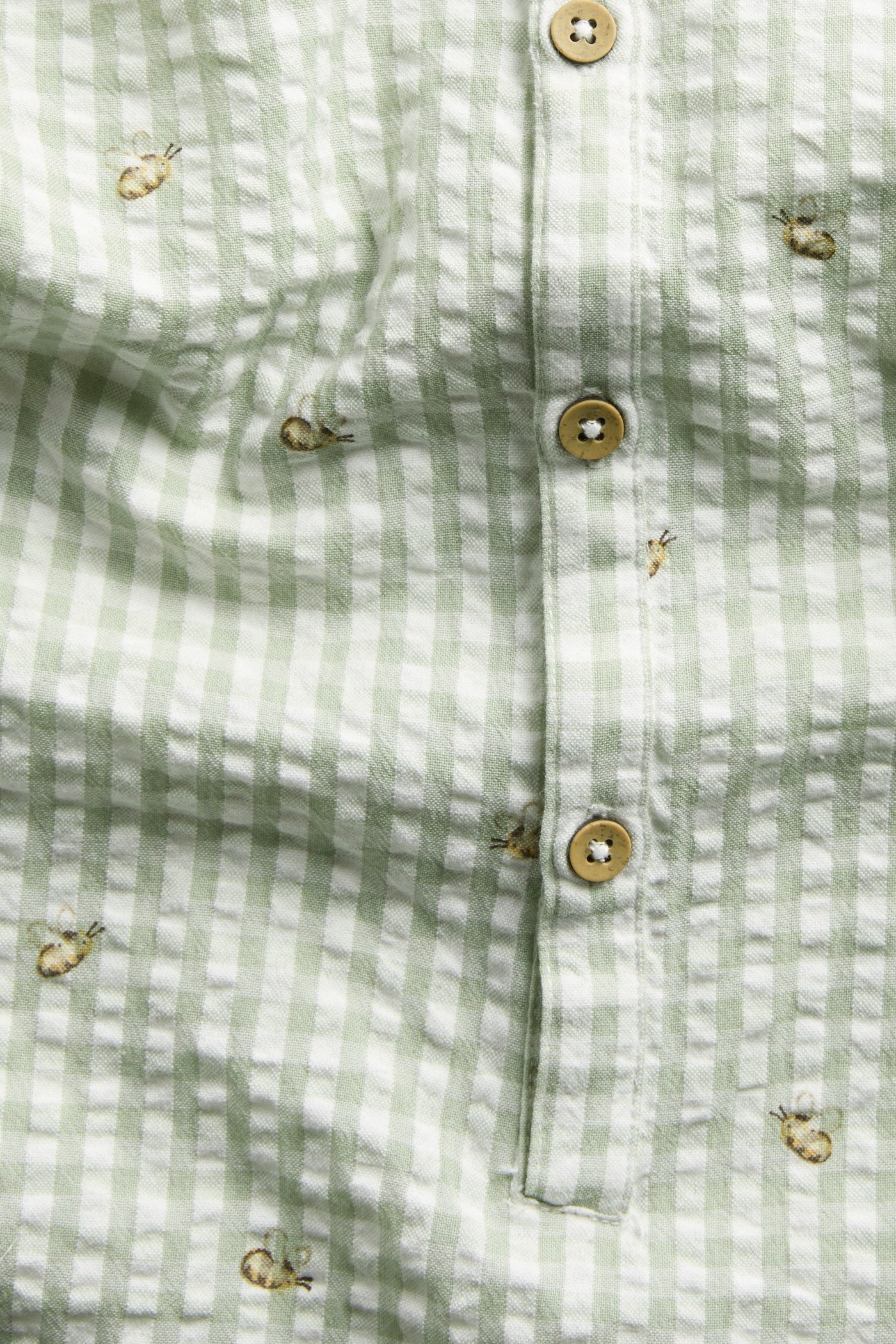 Baby checked romper with bee motif