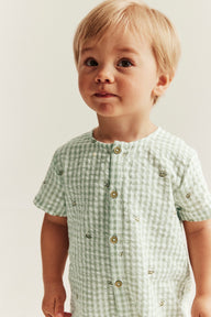 Baby checked romper with bee motif