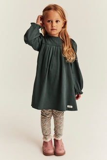 Kids green dress with cross-stitch embroidery