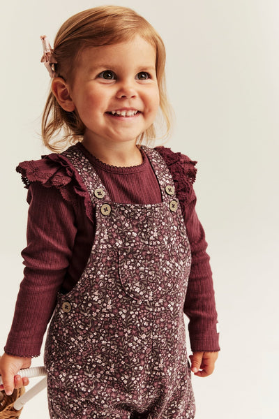 Baby burgundy ditsy floral dungarees