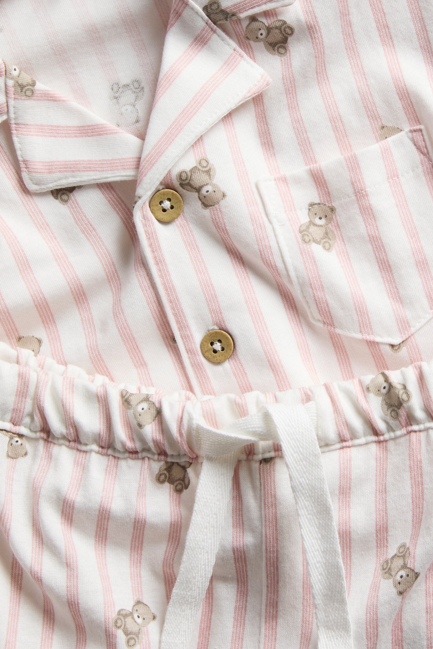 Kids striped pajamas with teddy bear motif