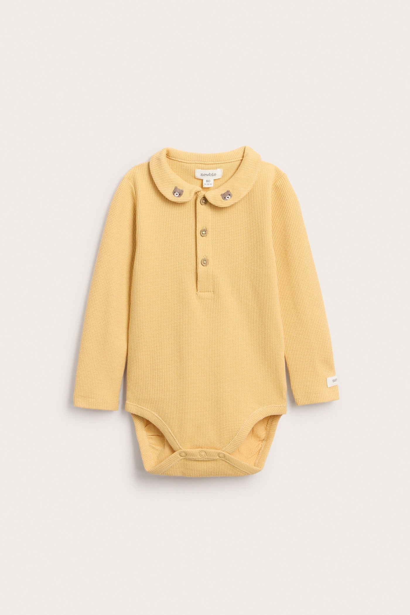 Baby yellow long sleeve waffle bodysuit