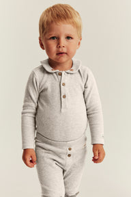 Baby beige long sleeve waffle bodysuit
