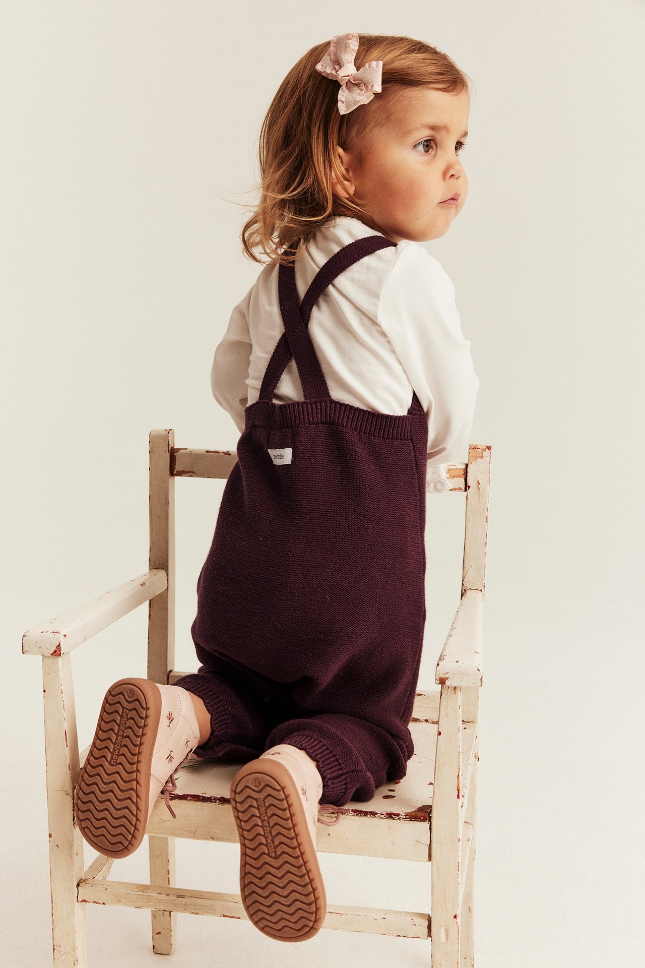 Baby knitted dungarees with embroidery