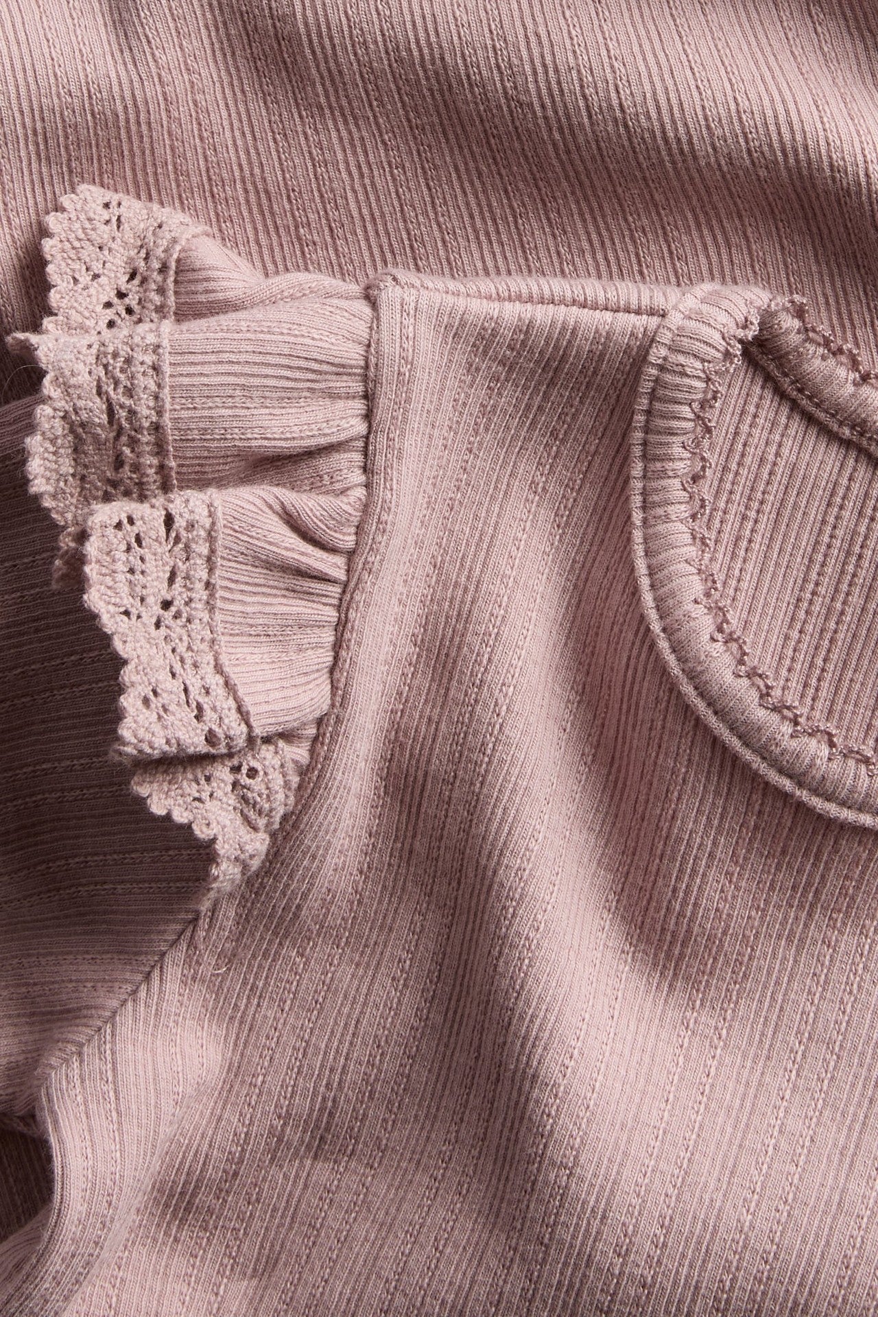 Baby pink ribbed bodysuit with frills