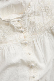 Women’s white embroidered blouse