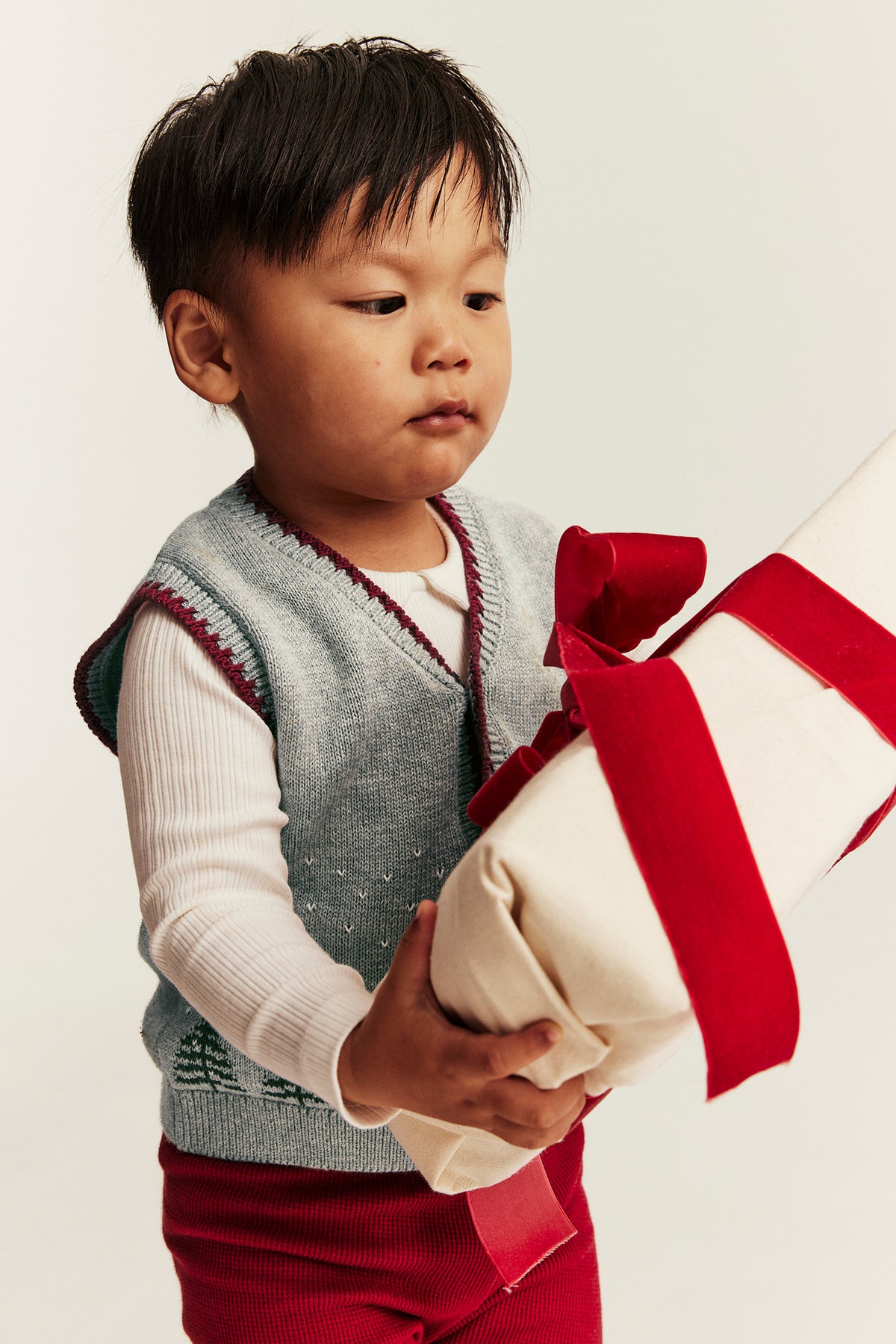 Baby grey knitted vest with Christmas motif
