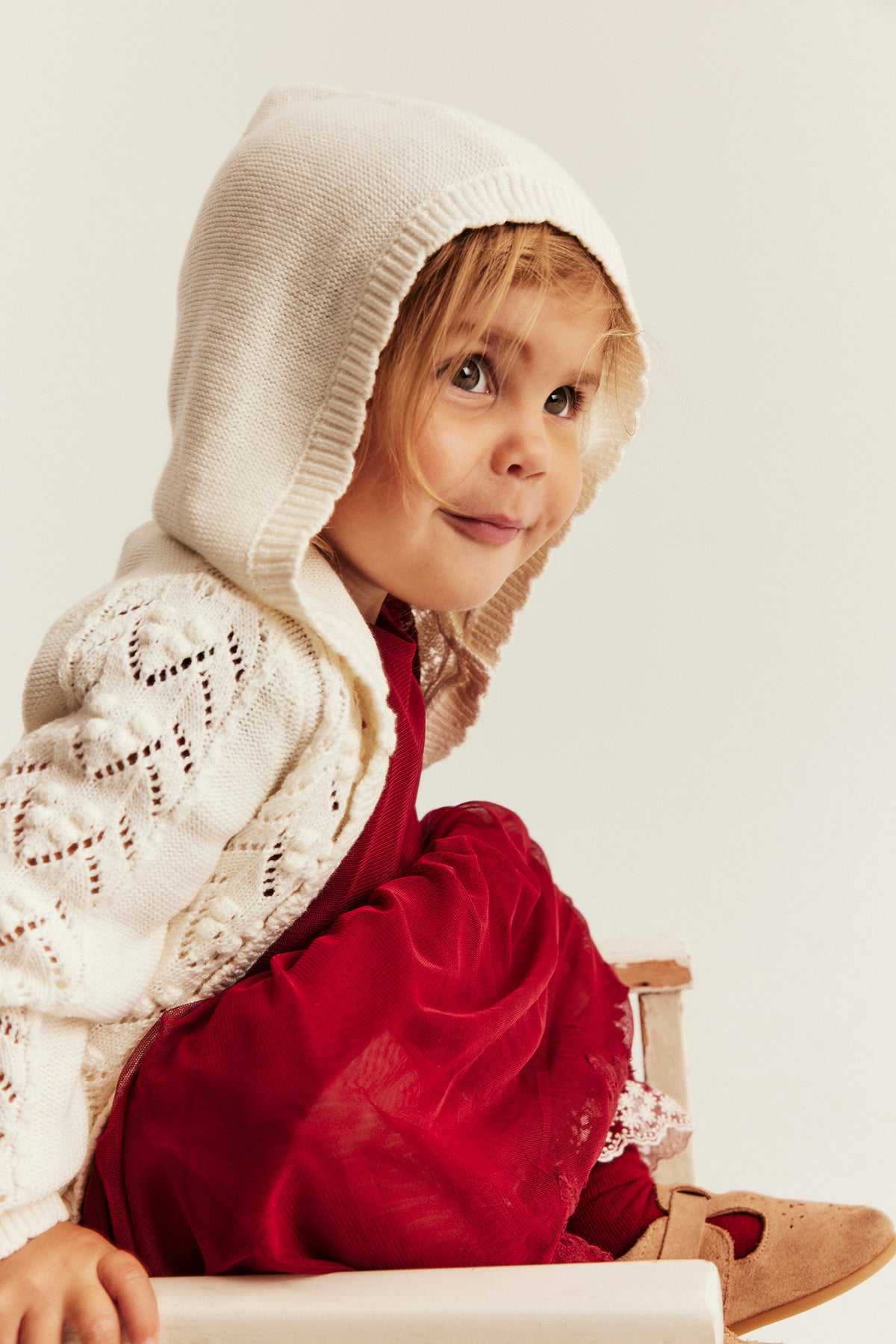 Baby white knitted cardigan with hood