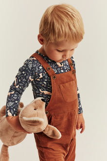 Baby blue bodysuit with all-over pattern
