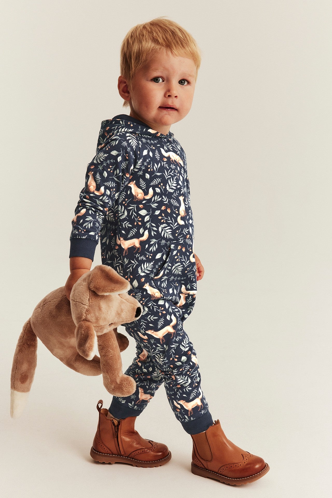 Baby blue jumpsuit with all-over fox pattern