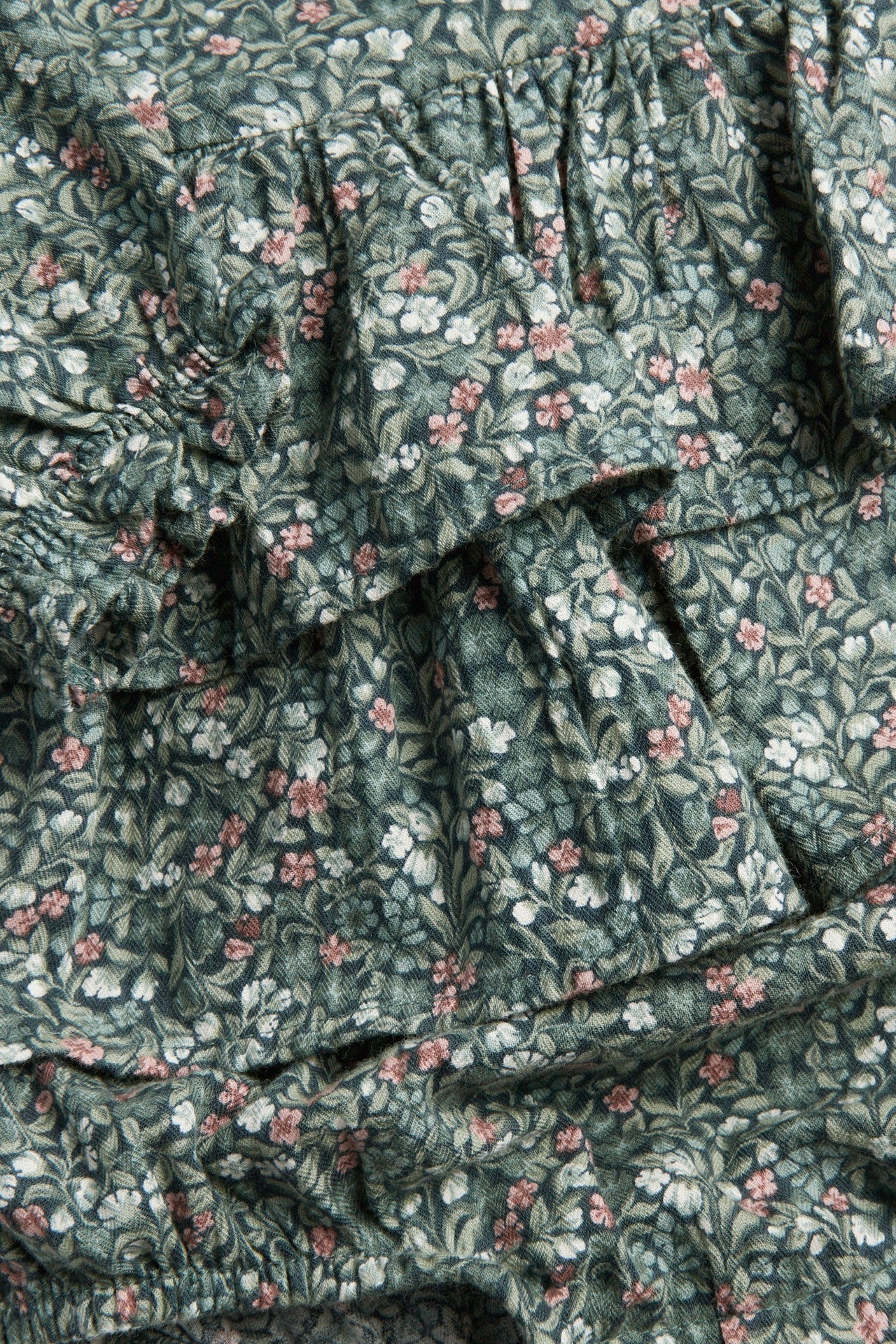 Baby turquoise floral bodysuit with frill