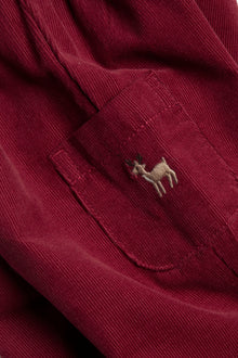 Baby red corduroy trousers with embroidery