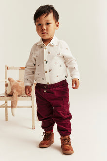 Baby red corduroy trousers with embroidery
