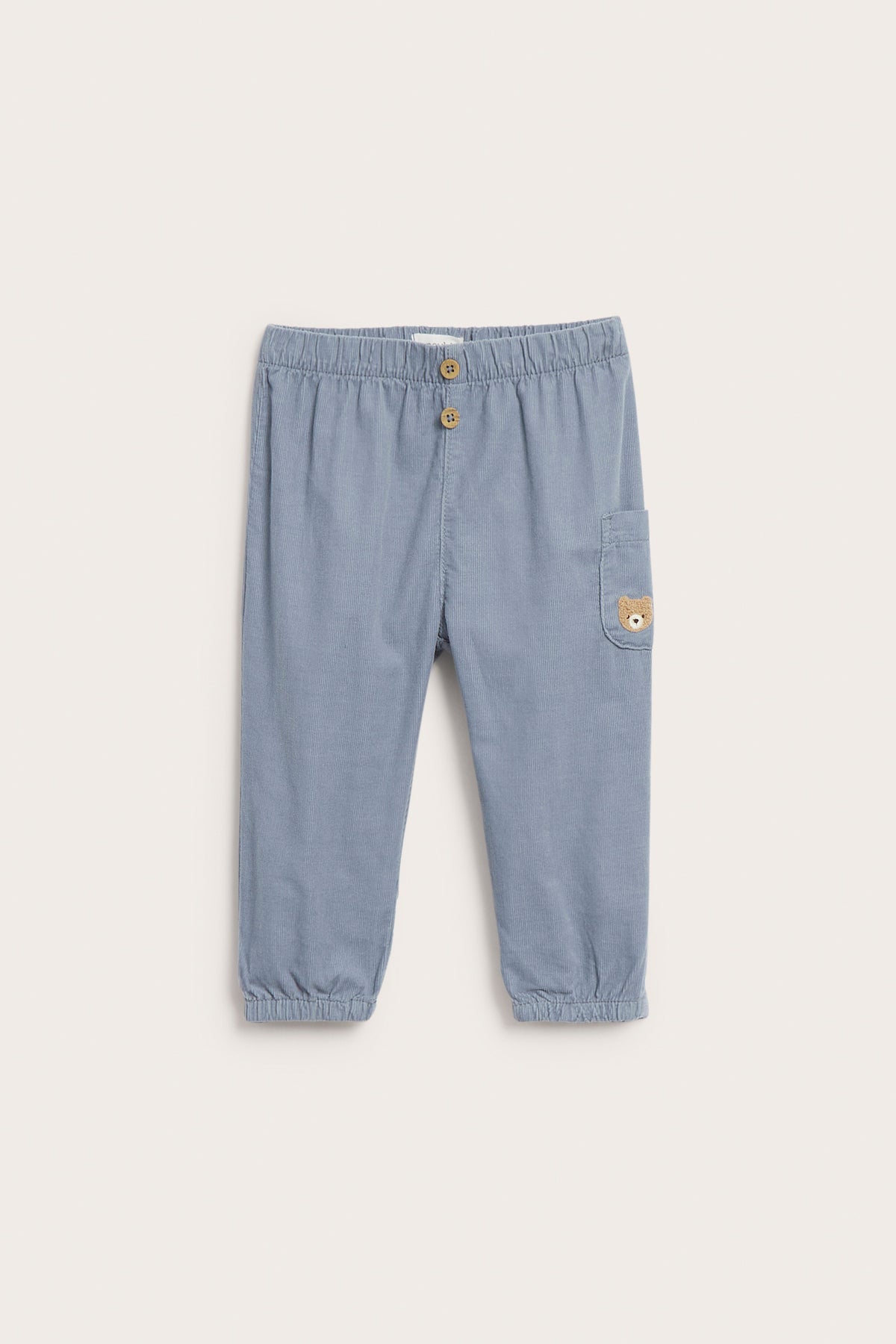 Baby blue corduroy trousers with embroidery
