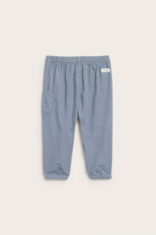 Baby blue corduroy trousers with embroidery