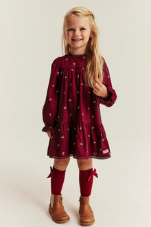 Kids red long-sleeved dress with reindeers