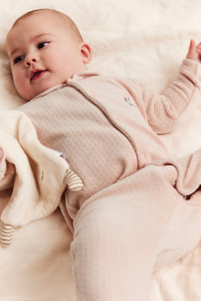 Baby pink pyjamas in velour with a collar