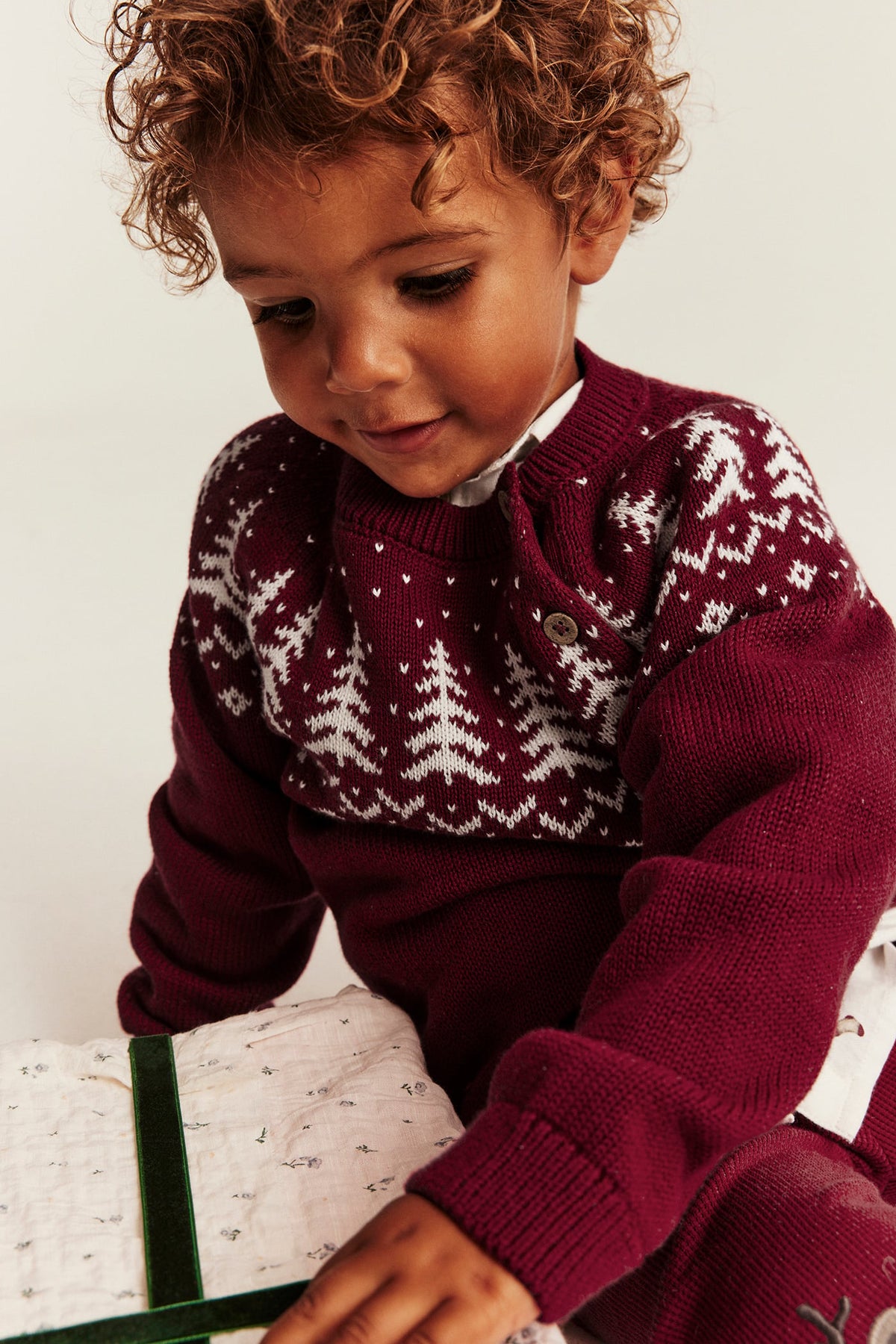 Kids red knitted Christmas jumper with buttons