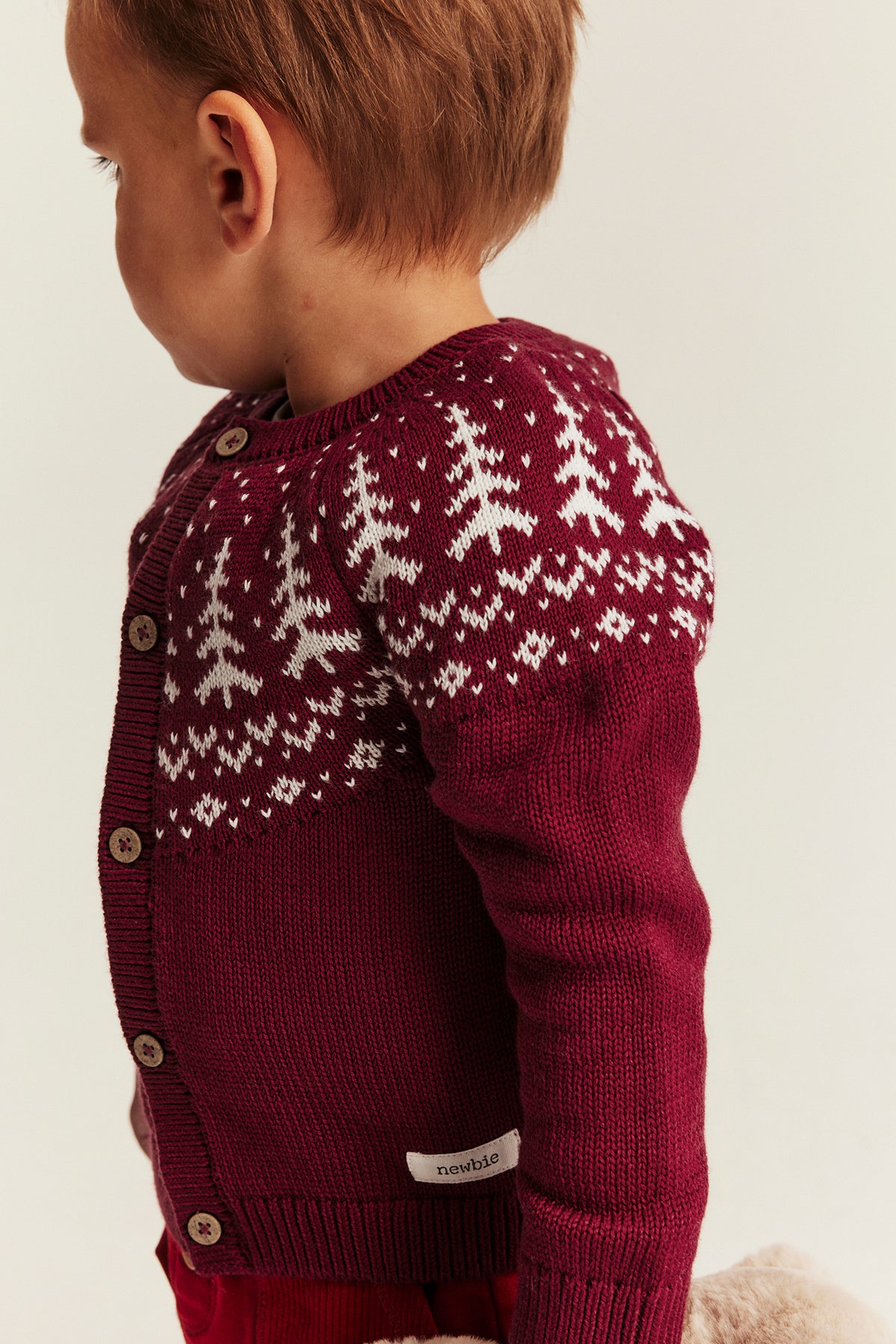Baby red knitted cardigan with Christmas trees