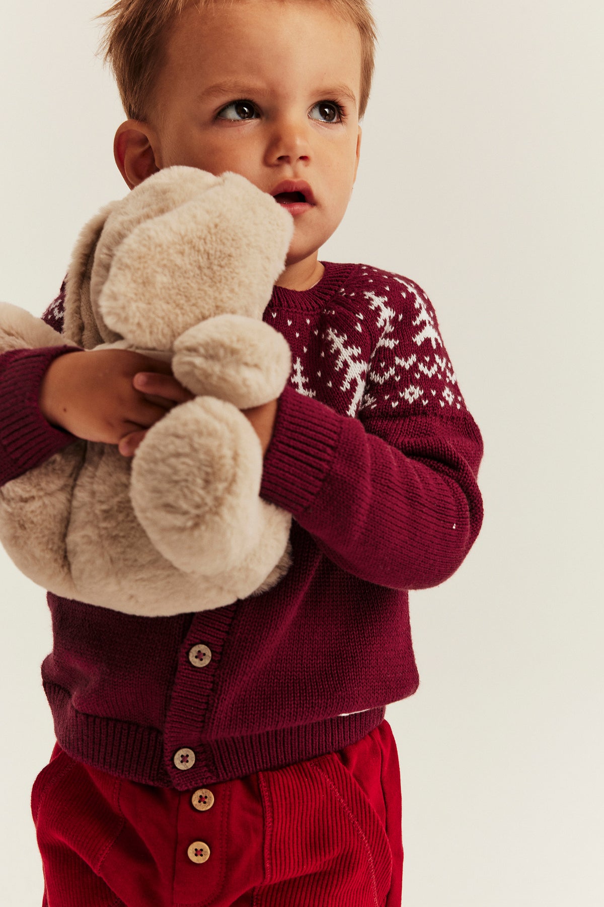Baby red knitted cardigan with Christmas trees