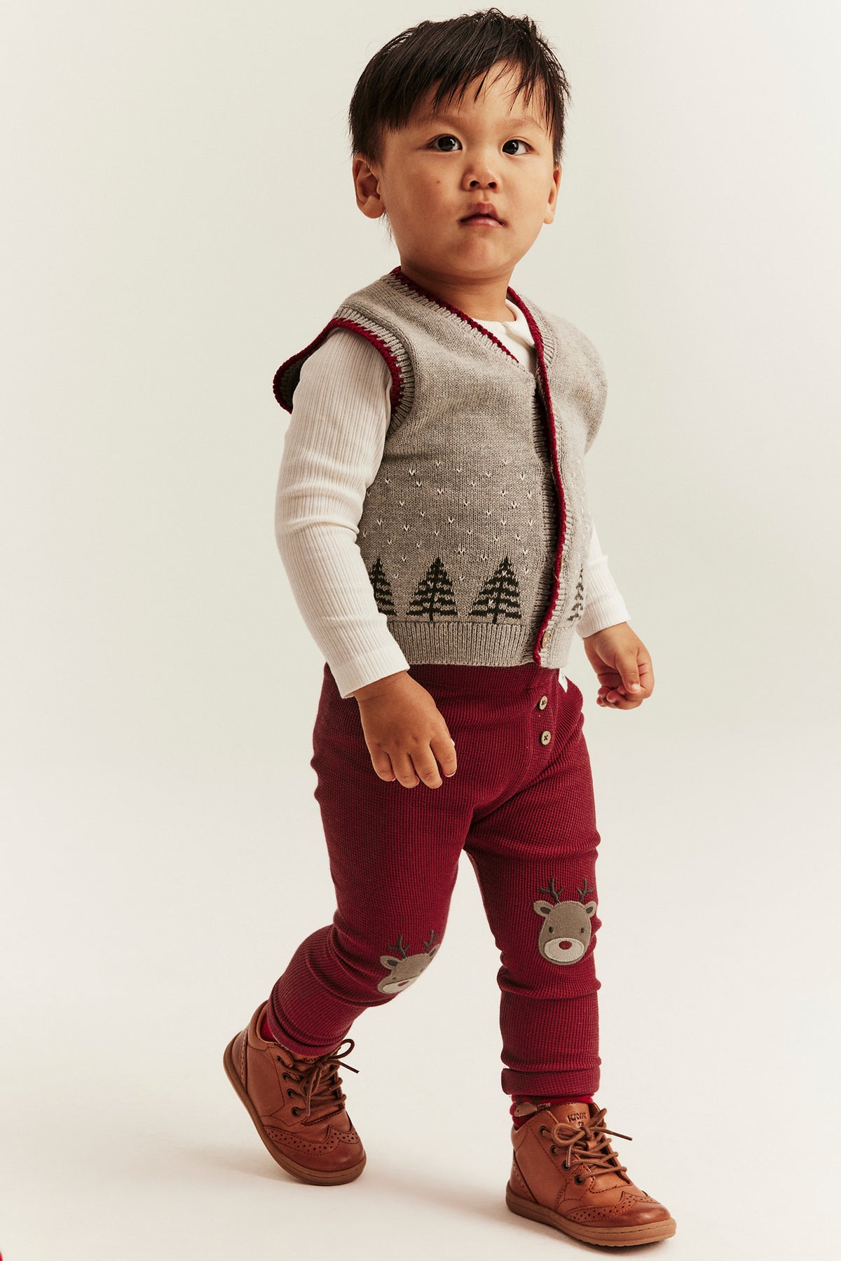Baby red leggings with Christmas detail