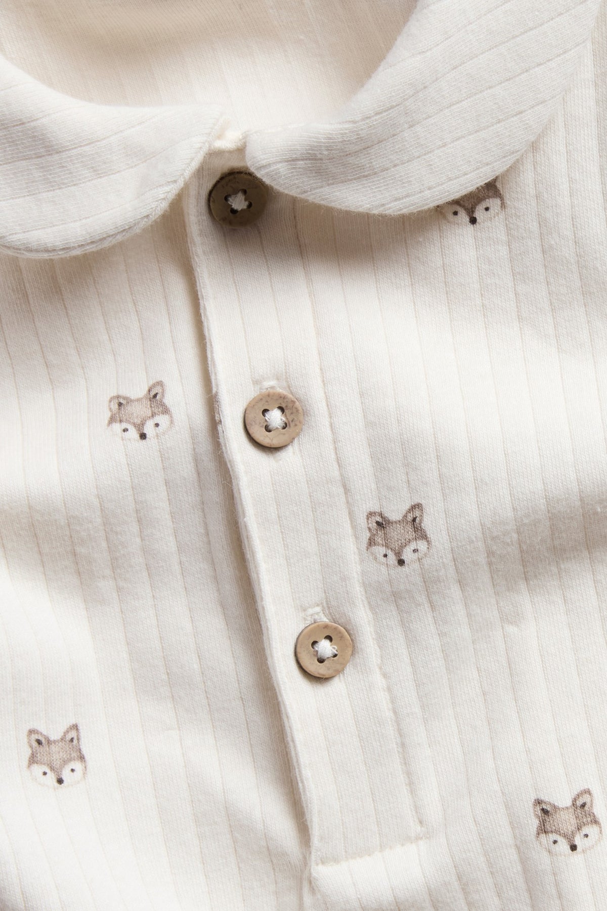 Baby white ribbed bodysuit with collar