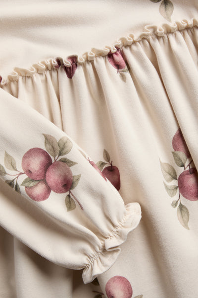 Kids beige jersey dress with apple print