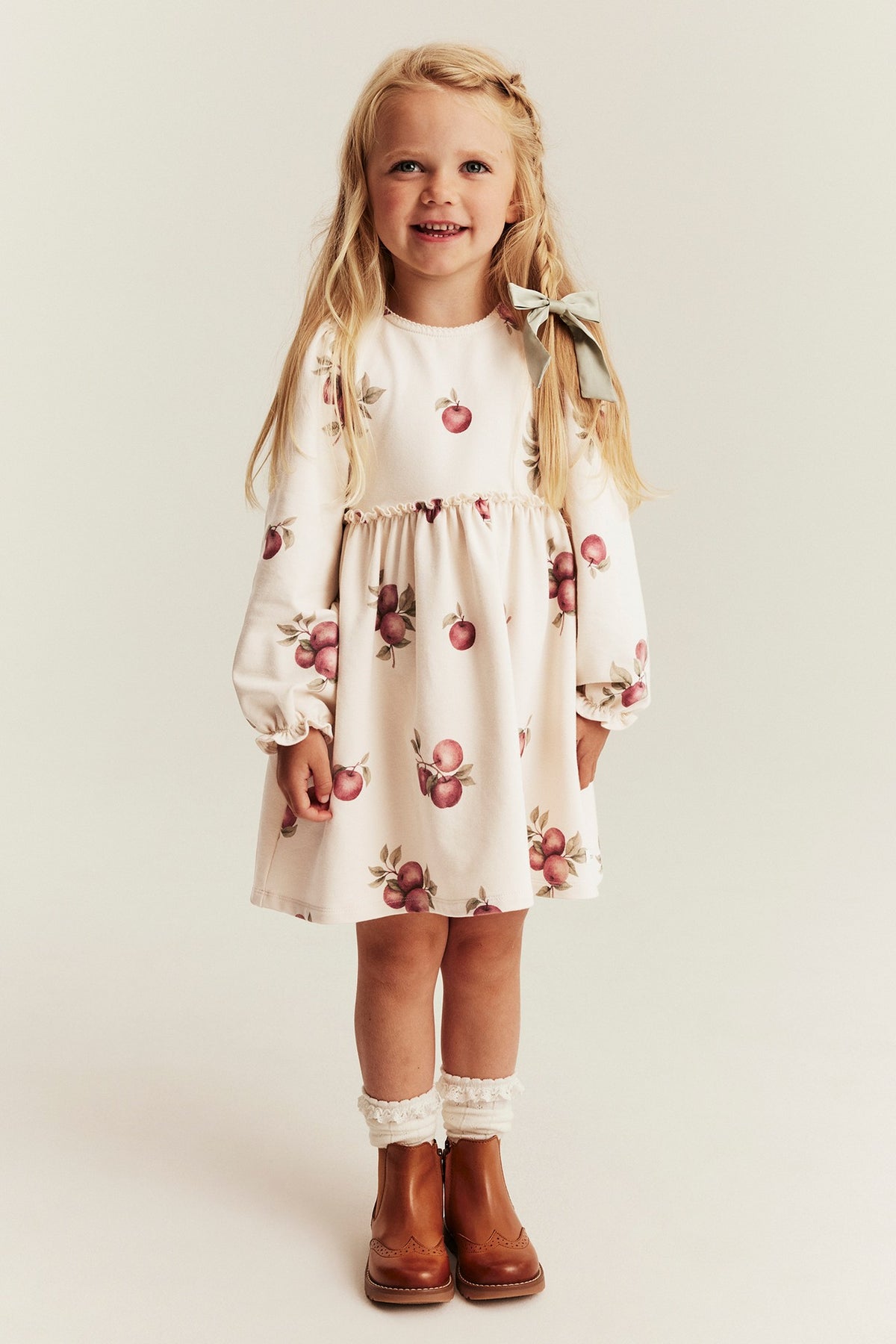 Kids beige jersey dress with apple print