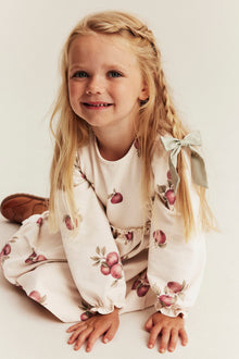 Kids beige jersey dress with apple print