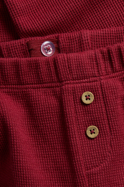 Kids red waffle leggings with Christmas motif