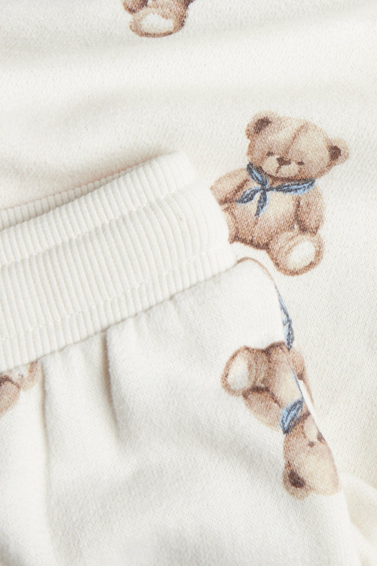 Baby white jogging bottoms with teddy bear print