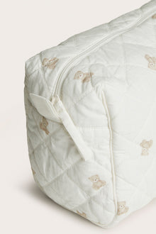 White quilted toiletry bag with teddy bear pattern
