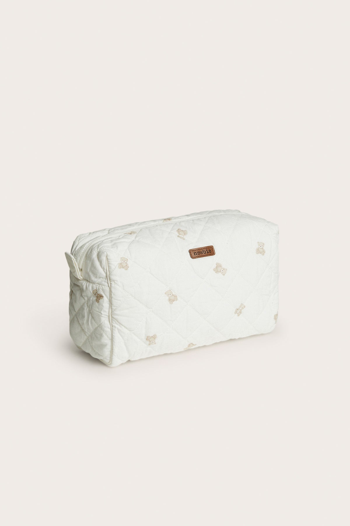 White quilted toiletry bag with teddy bear pattern