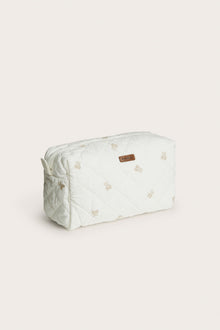 White quilted toiletry bag with teddy bear pattern