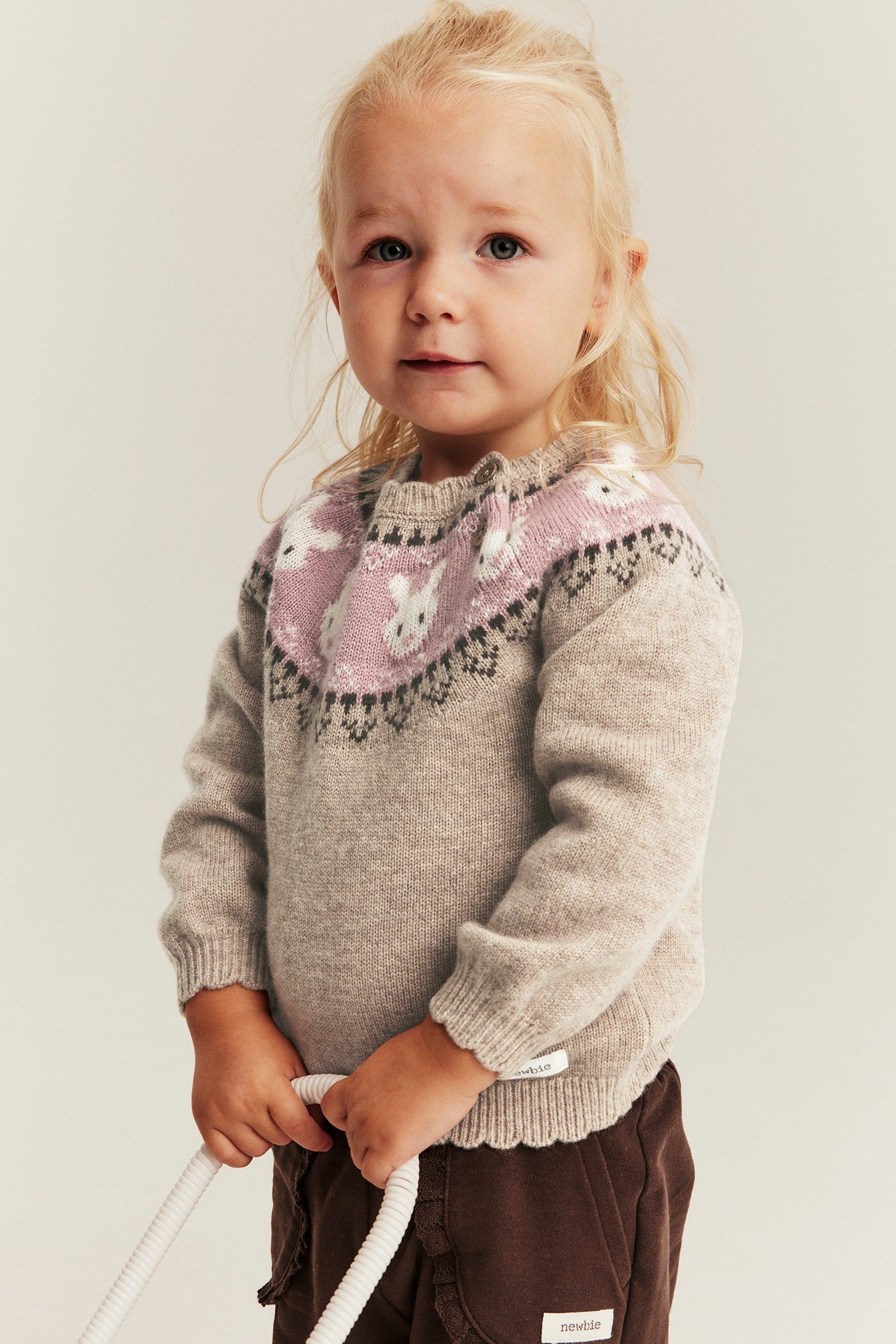 Baby beige knitted wool jumper with rabbits