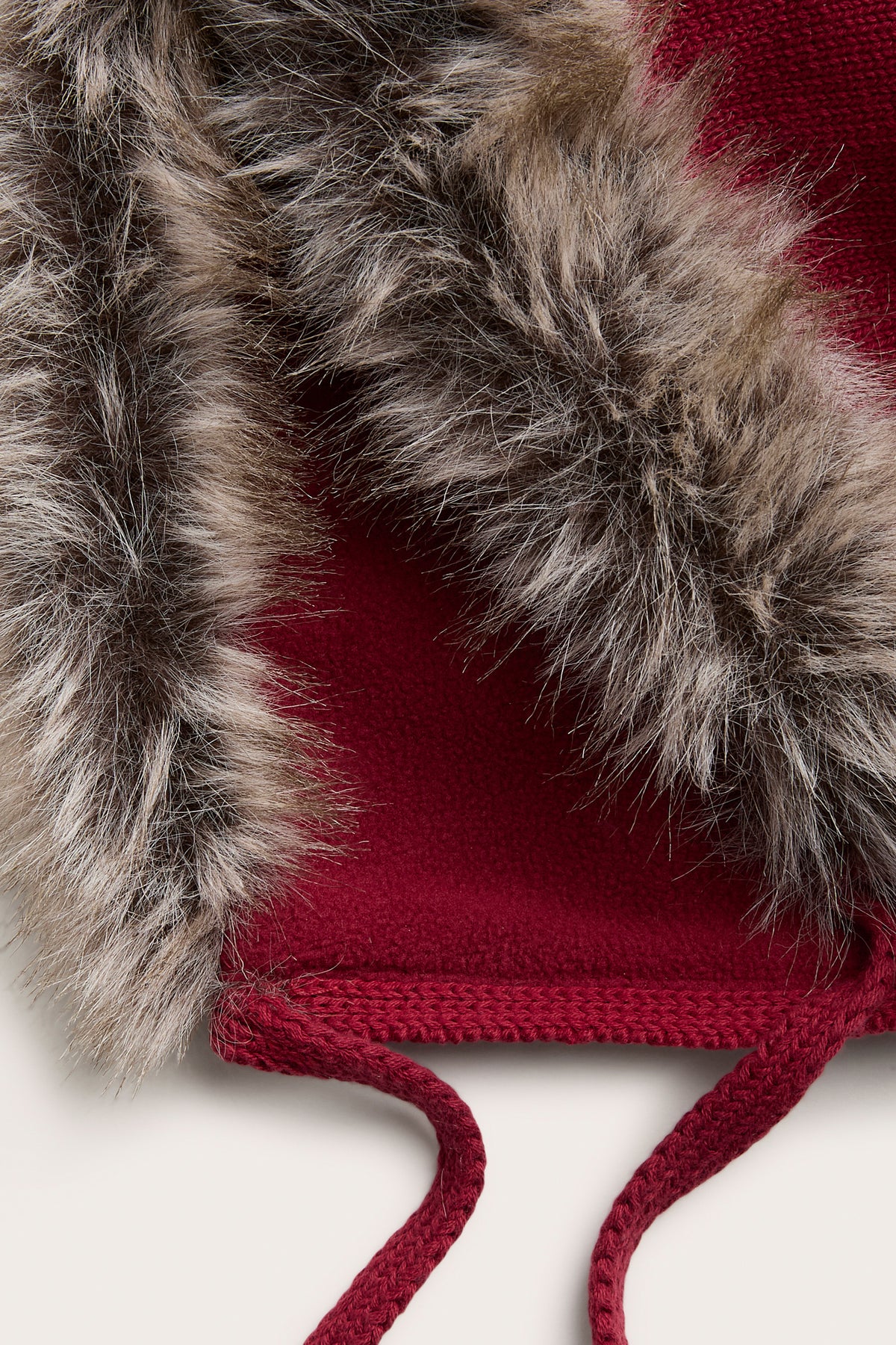 Kids red knitted hat with fake fur