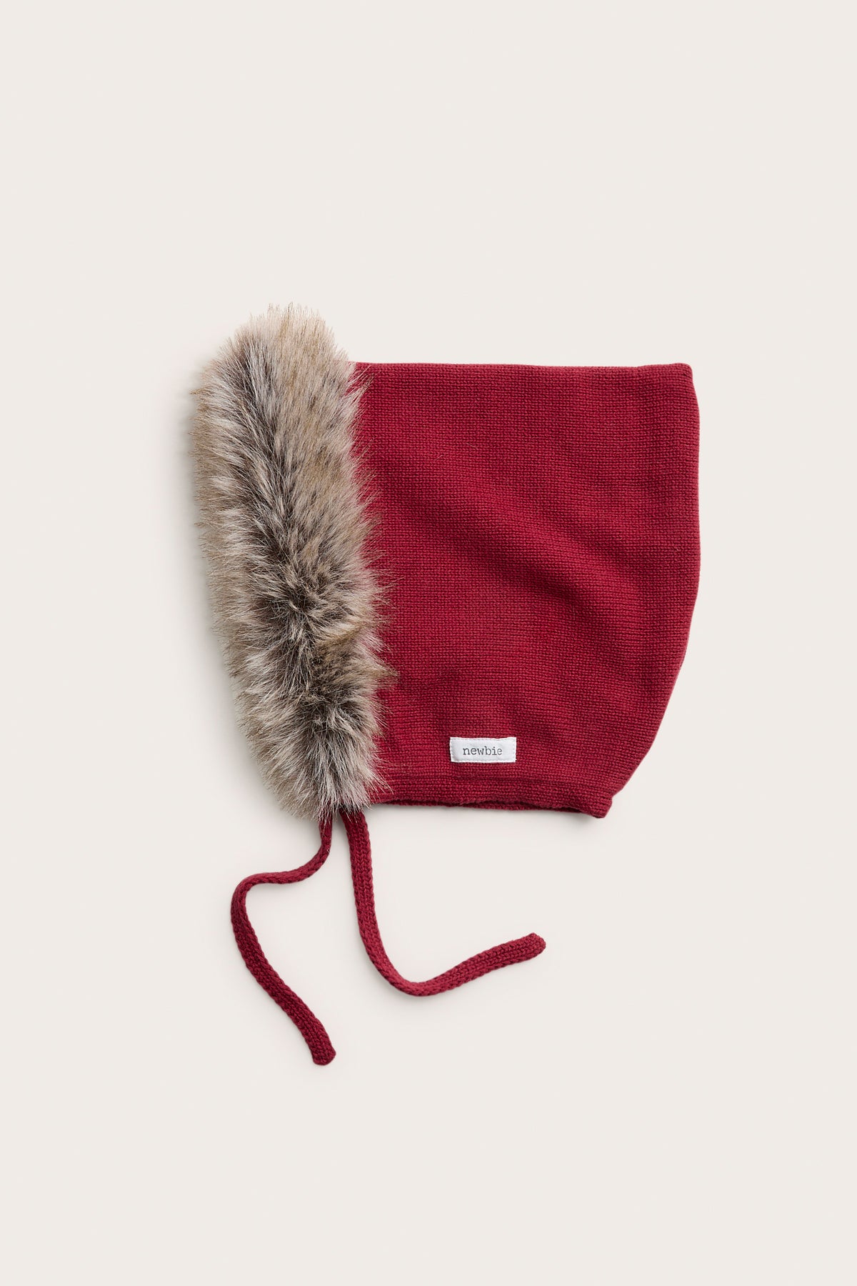 Kids red knitted hat with fake fur