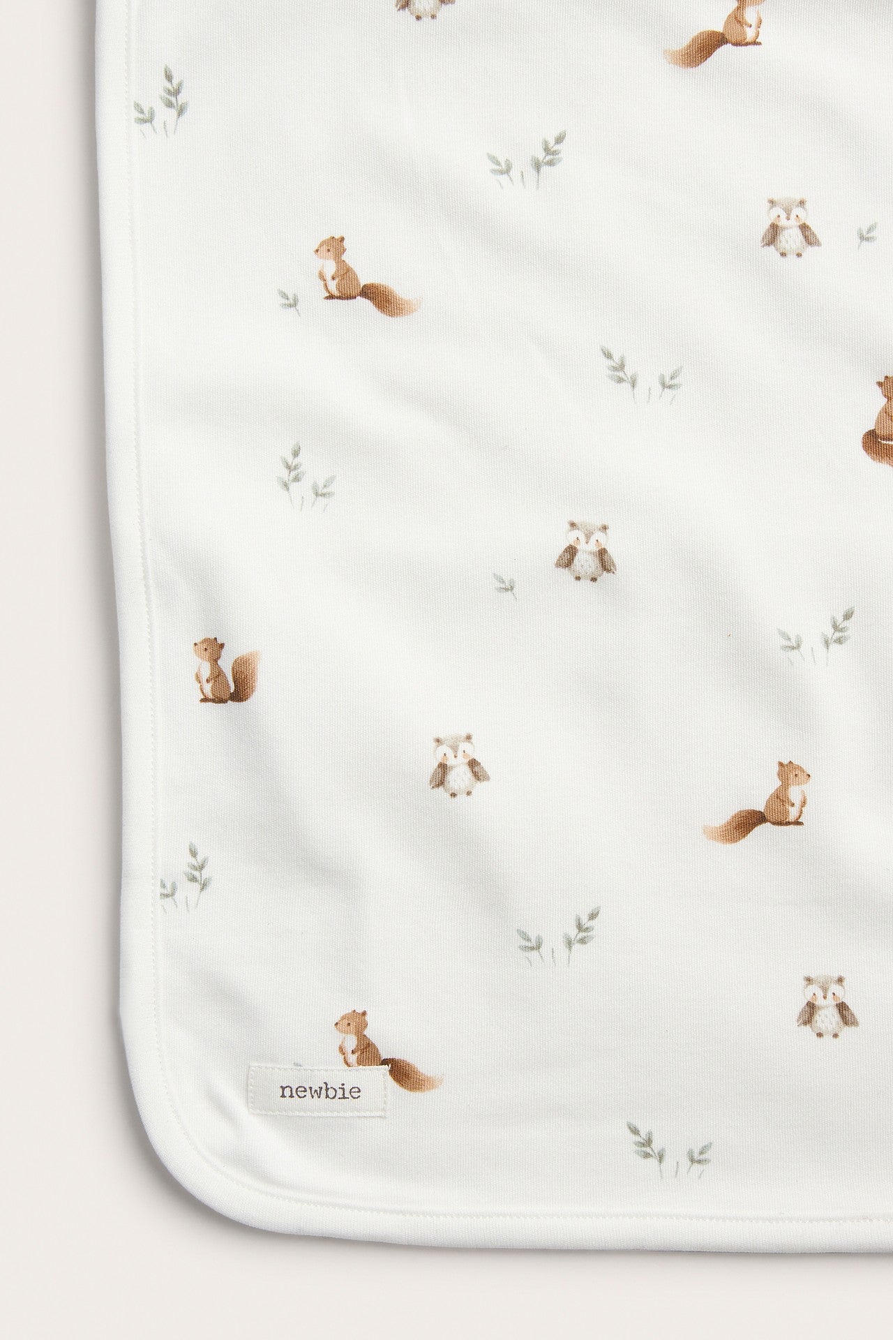 White patterned baby blanket