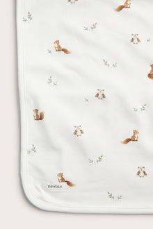 White patterned baby blanket