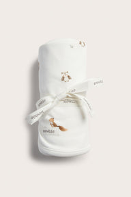 White patterned baby blanket