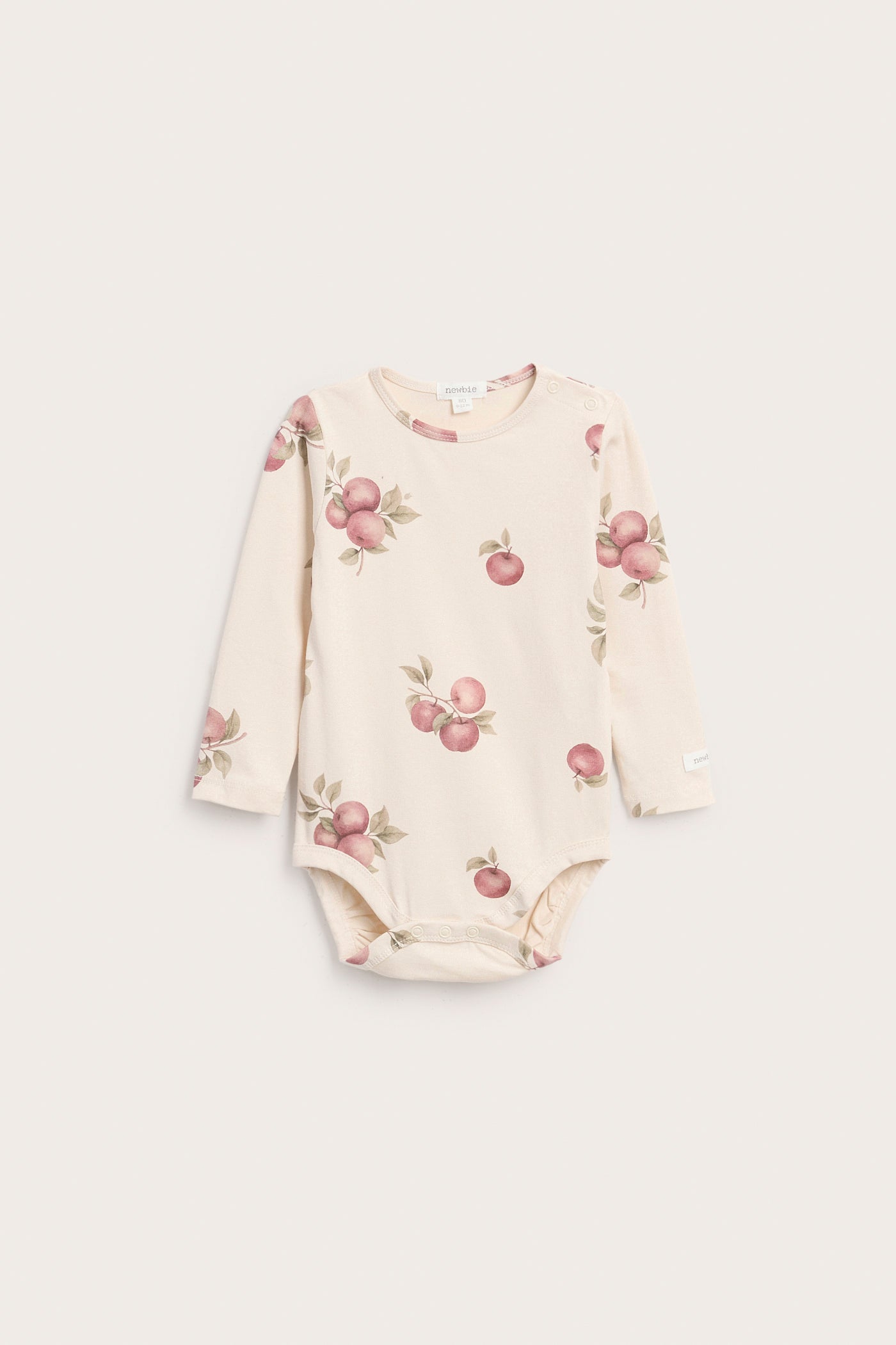 Baby beige bodysuit with apple pattern