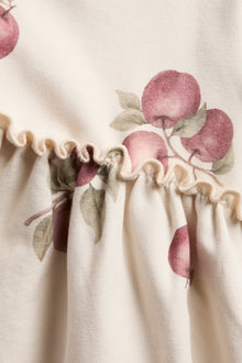Baby beige dress with apple pattern