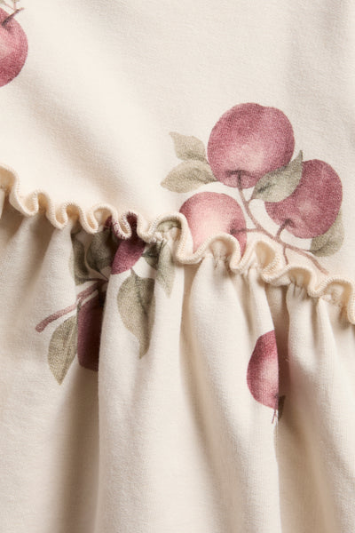 Baby beige dress with apple pattern