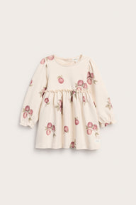 Baby beige dress with apple pattern