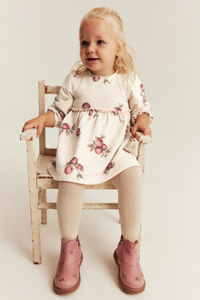 Baby beige dress with apple pattern