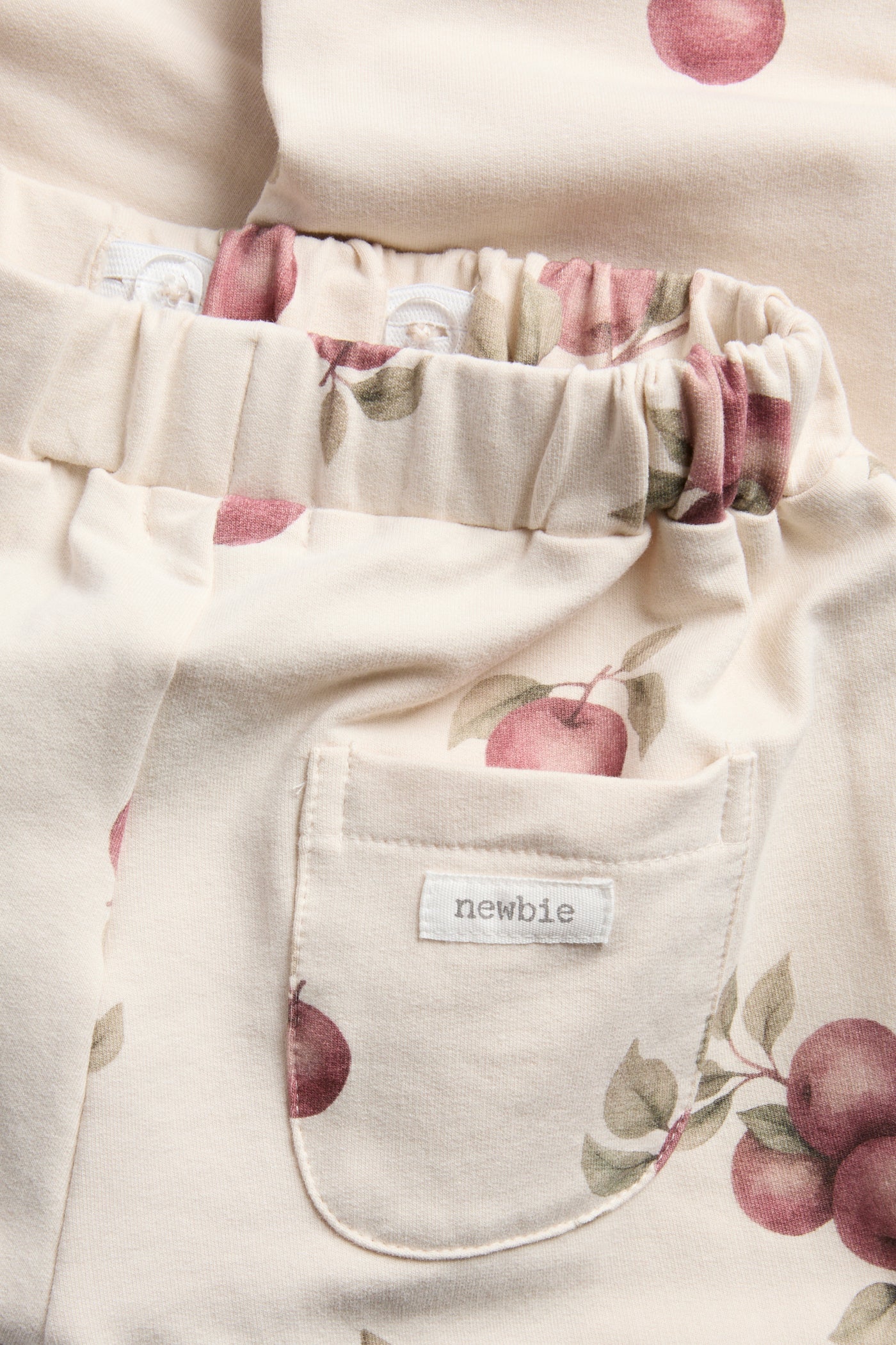 Kids beige apple-print joggers