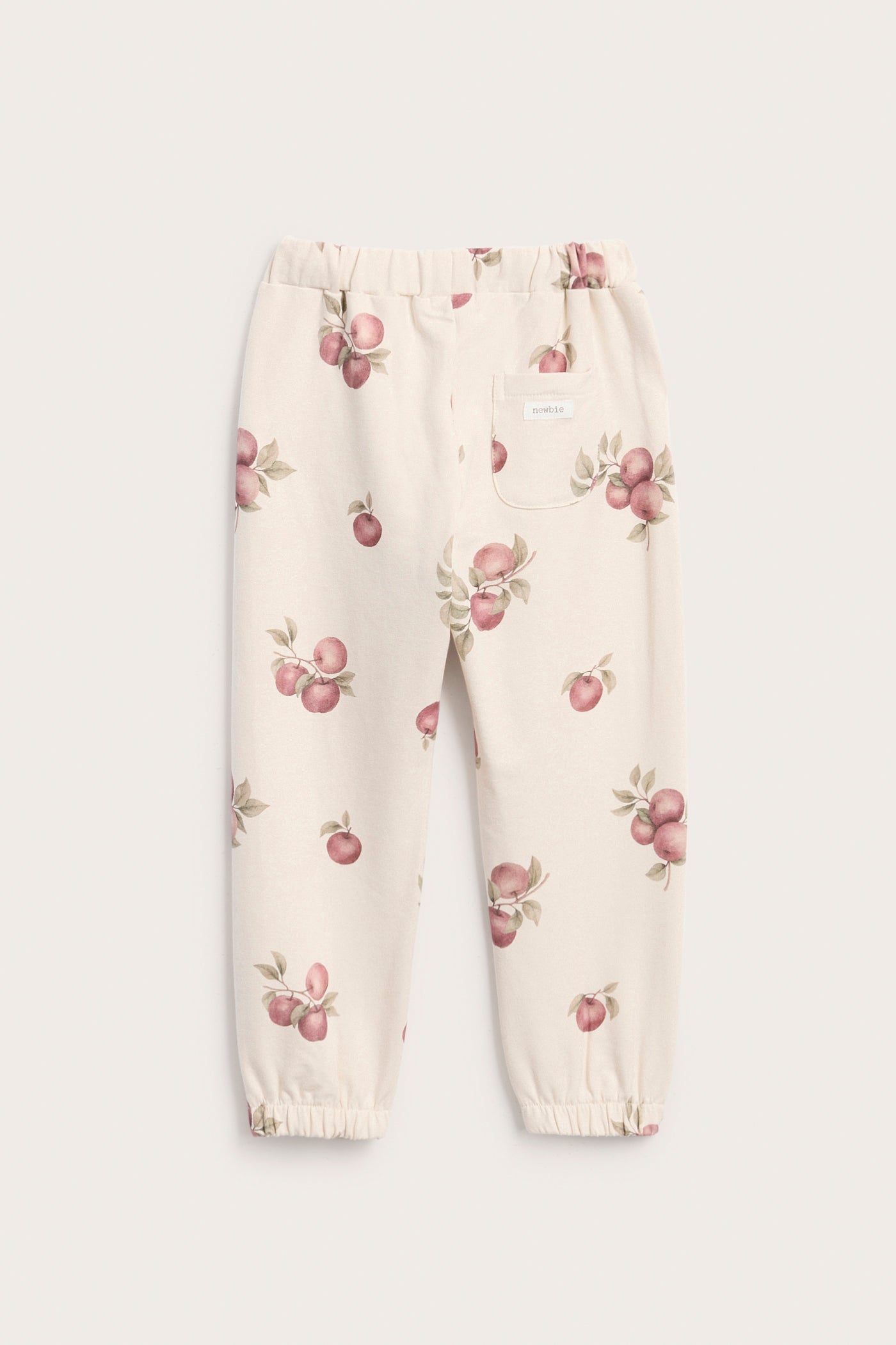 Kids beige apple-print joggers