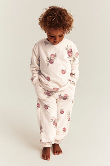 Kids beige apple-print joggers