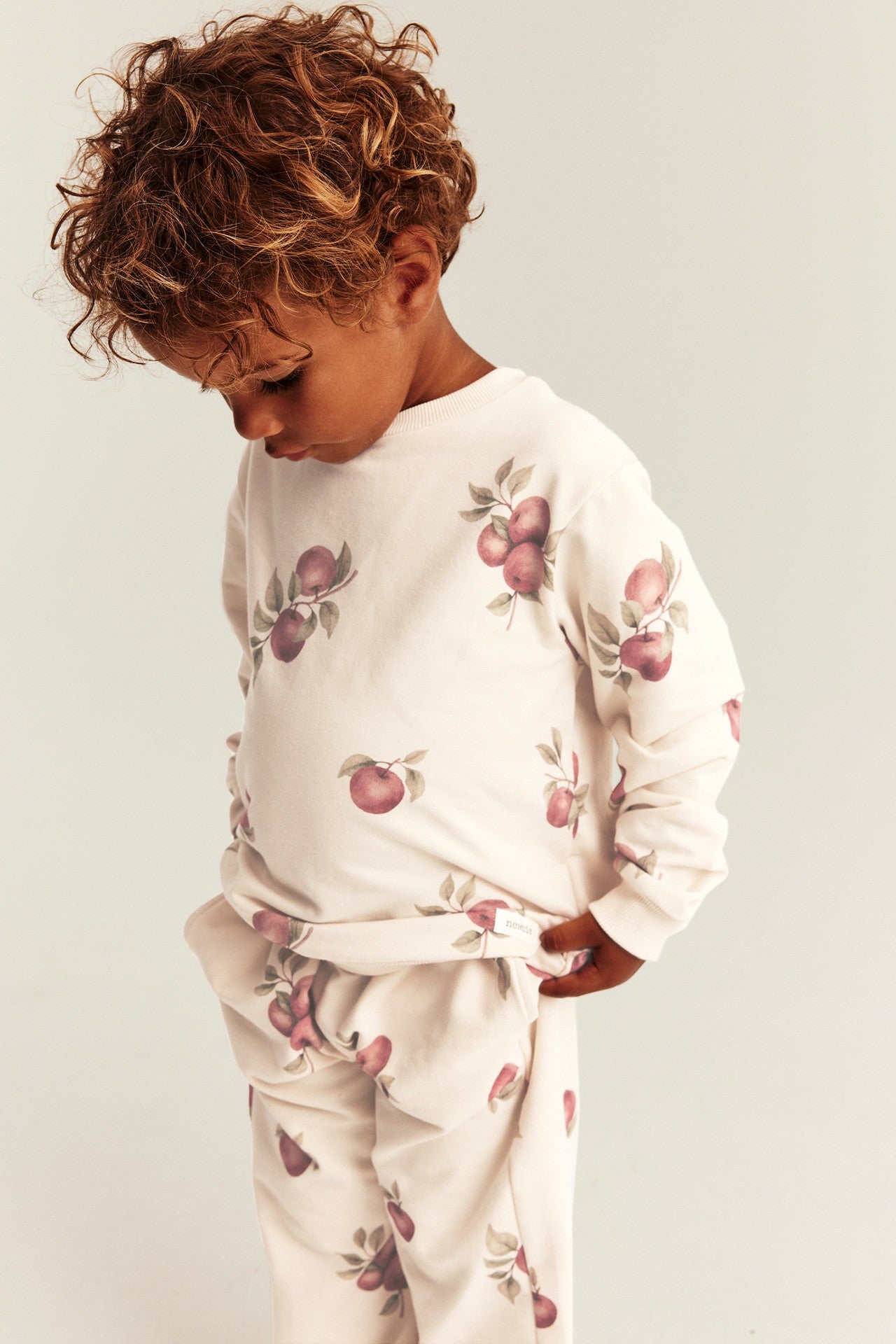 Baby & Kids beige sweatshirt with apple pattern