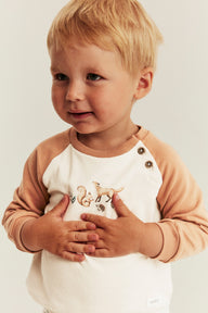 Baby beige sweatshirt with animal print
